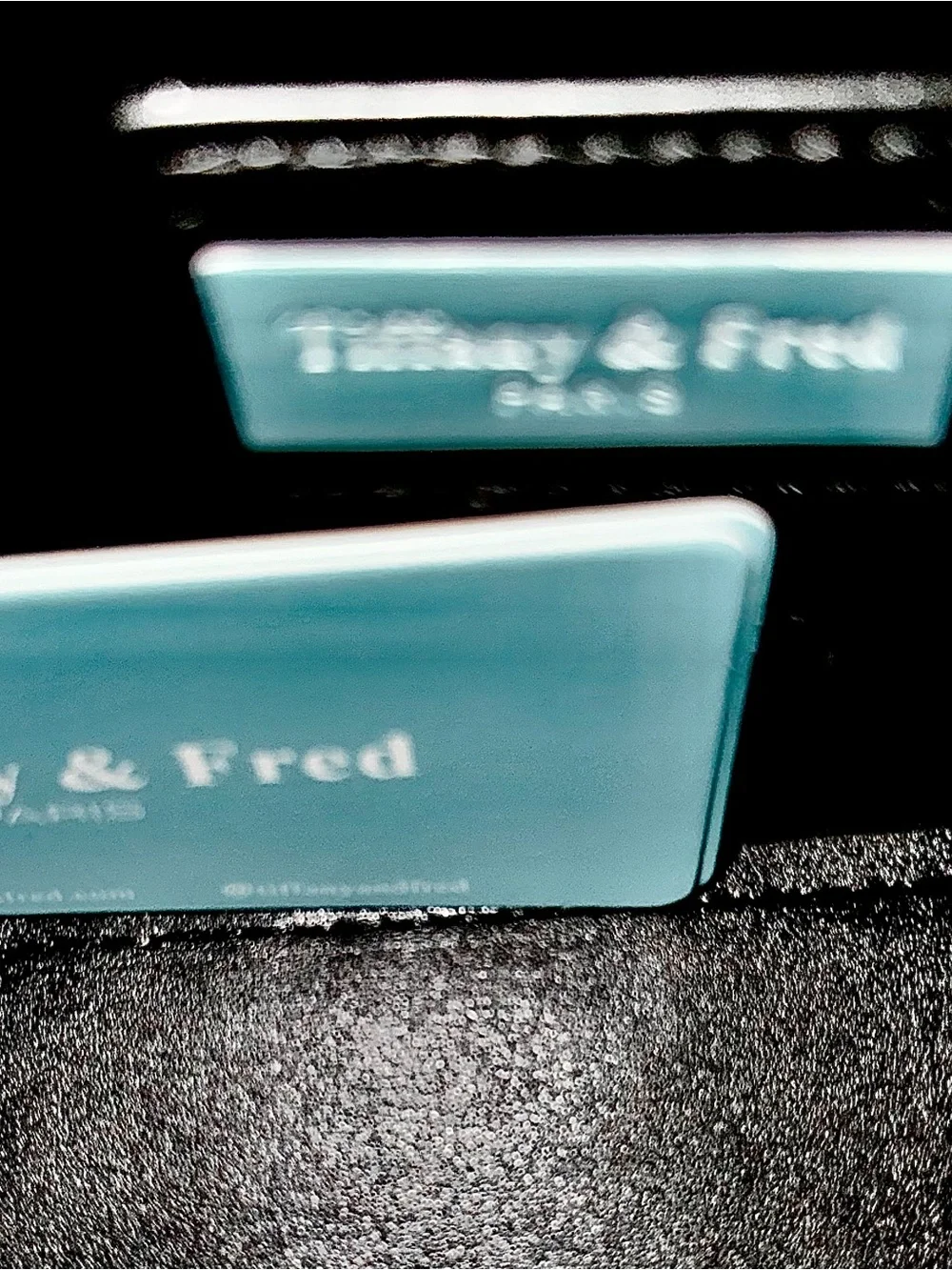 Tiffany & Fred Black Leather ,Shoulder Bag with Blue Logo Plaque